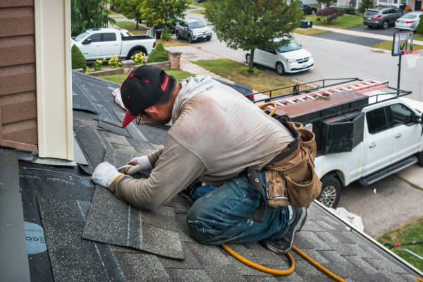 Professional Roofing technician working in Breesport, NY